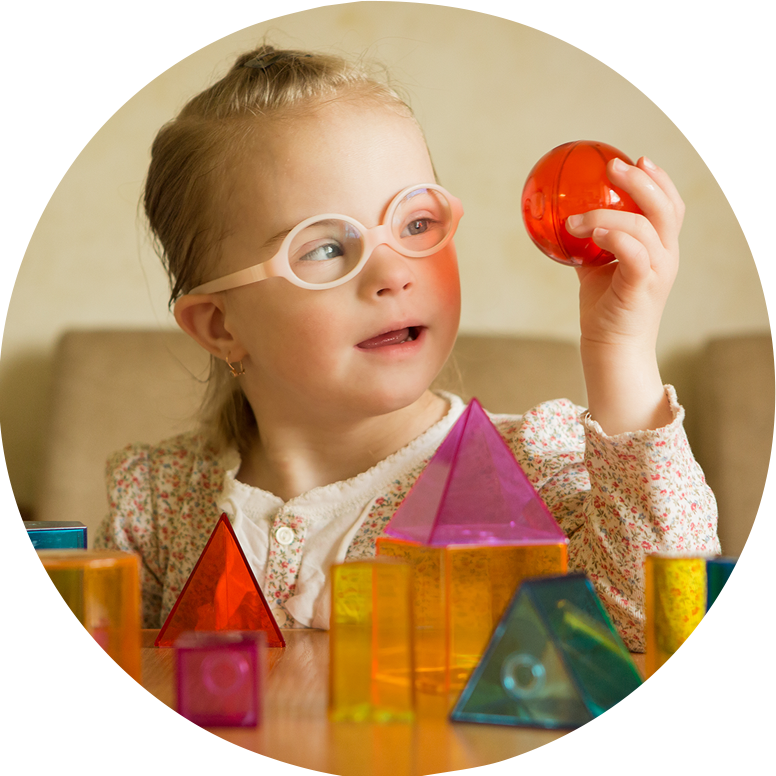 Disabled girl holding blocks